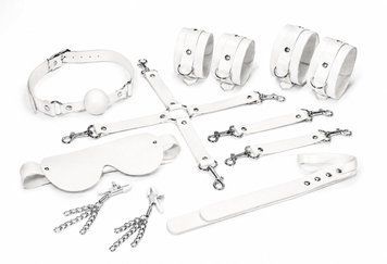 Набір Feral Feelings BDSM Kit 7 White, наручники, поножі, конектор, маска, падл, кляп, затискачі,  - 1